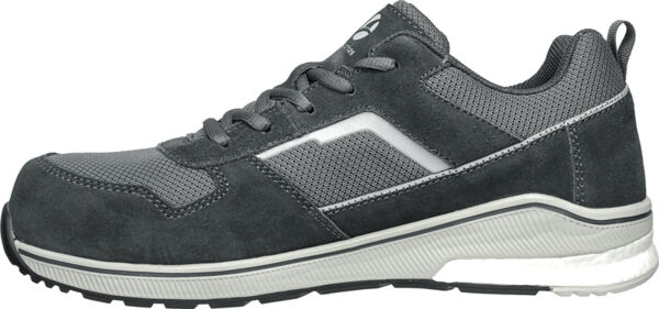 The shoe is a sporty, gray sneaker with a mix of matte and textured surfaces. It has a lightweight sole and is equipped with laces.