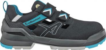 The shoe is sporty, with a black upper and blue accents. It has two wide Velcro straps and a sturdy, non-slip sole. Ideal for outdoor activities.