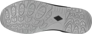 The image displays the underside of a shoe. The sole is gray with a non-slip pattern consisting of various round and rectangular shapes.