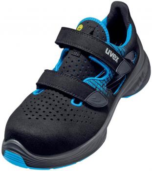 The shoe is sporty and modern, with a black upper and blue accents. It has two wide Velcro straps and a breezy, perforated structure for ventilation.