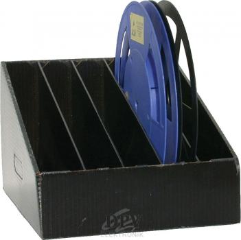 The image shows a black, rectangular box with dividers. Inside, there is a large blue film reel sitting on one of the partitions.