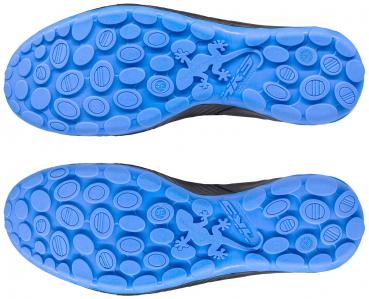 The image shows the sole of shoes with a blue rubber sole. The surface is equipped with various oval and round protrusions that provide good grip.