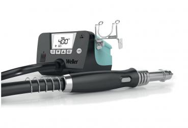 The image displays a soldering iron kit. It includes a digital control unit with a display and controls. Attached to a hose is the soldering tip.