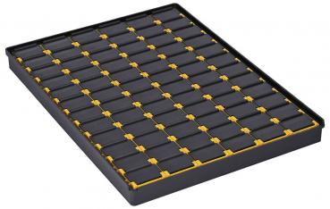 The image shows a flat, rectangular tray with many small compartments. The compartments are black with yellow dividers, regularly arranged and allow for neat storage.