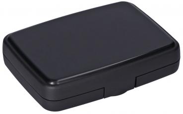 The image shows a rectangular, flat, black box with rounded corners. It features a simple clasp and a smooth surface. The box appears compact and unobtrusive.