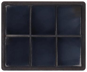 The image displays a rectangular palette with six equally sized, rectangular compartments. The compartments are black and feature a smooth, glossy surface. The frame is also dark.