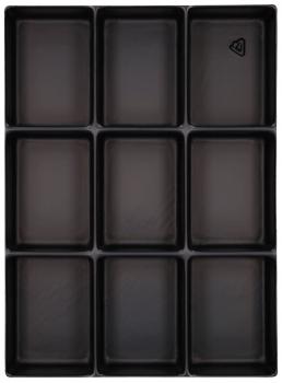 The image shows a black baking pan with nine rectangular indentations, arranged in three rows and three columns. Each indentation has a clear, square border.