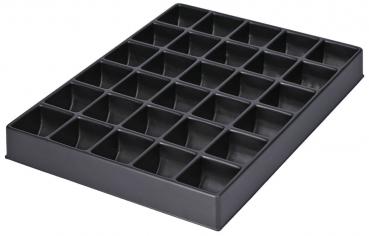 The image shows a flat, black plastic plate with 36 small, square compartments. Each compartment is the same size and neatly arranged, ideal for storing small items.