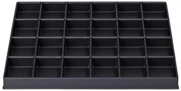 The image shows a black box with 25 square compartments, arranged in 5 rows and 5 columns. It has a flat, rectangular shape and is made of plastic.