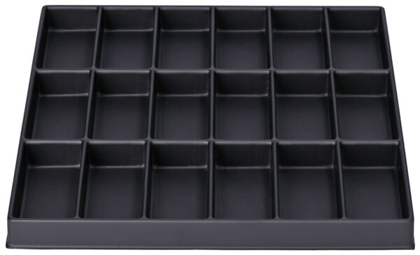 The image shows a black, flat plastic mold with 20 uniform, rectangular indentations, arranged in a grid of 4 rows and 5 columns.