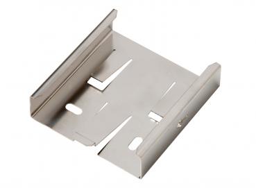 The image displays a rectangular, flat metal bracket. It has cut-out openings and features a silver, shiny surface. The edges are sharp and clearly defined.