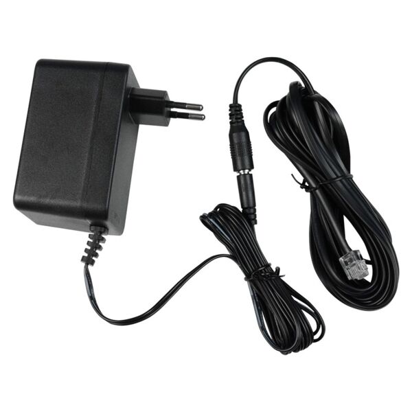 The image displays a black power adapter with two plug pins for the socket. A black cable leads to the connector, which has a round socket. The cable is long and flexible.