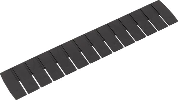 The image shows a long, black plastic strip. It has several evenly spaced, narrow slits separated by gaps.