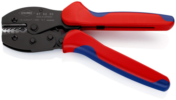 The image shows a crimping tool with black blades and red, ergonomic handles. It has a special structure to connect or crimp cables.