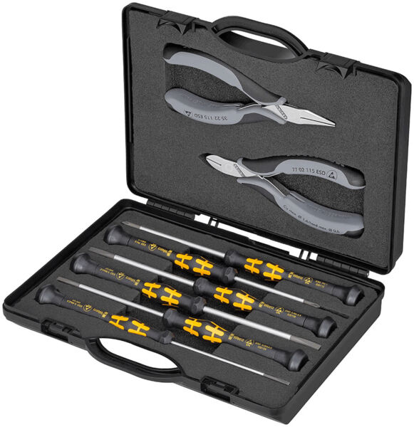 The image shows a toolbox with a black casing. Inside, there are two pliers and six screwdrivers with yellow and black handles.