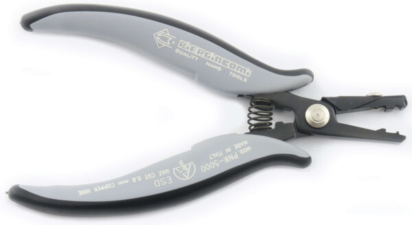 The image shows a pair of pliers with a gray handle and an opening mechanism. It has a pointed shape with various functions for gripping and cutting.