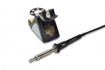 The image displays a soldering iron with a long handle and a metallic tip. Next to it is a soldering station with a sponge pad and wire for cleaning the tip.