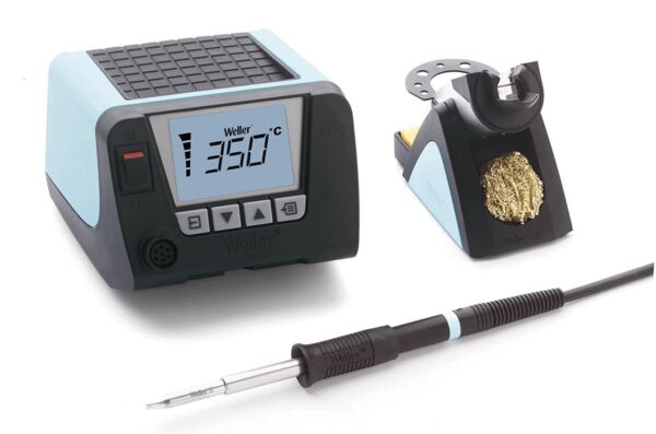 The image shows a soldering station with a digital display indicating a temperature of 350 °C. Next to the station is a soldering iron with a black handle. To the right, there is a holder for the soldering iron.