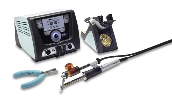 The image shows a soldering iron set. It includes a soldering iron with a cable, a soldering station with a digital display, a holder for the soldering iron, and a pair of tweezers.