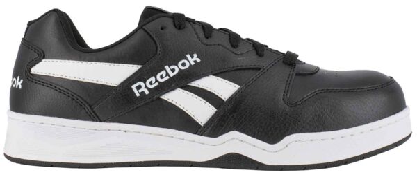 The image shows a black Reebok athletic shoe with white accents. It has a sturdy, smooth surface and classic lacing. The sole is wide and slightly elevated.