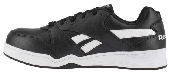 The shoe is a sporty sneaker in black with white accents. It has a flat sole, wide laces, and a padded tongue for comfort.