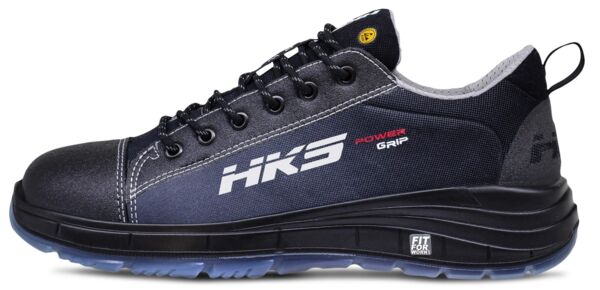 The shoe is a sporty, black half-shoe with gray and blue accents. It has a grippy, black sole and a reinforced toe cap for stability. The logo "HK5" is prominent.