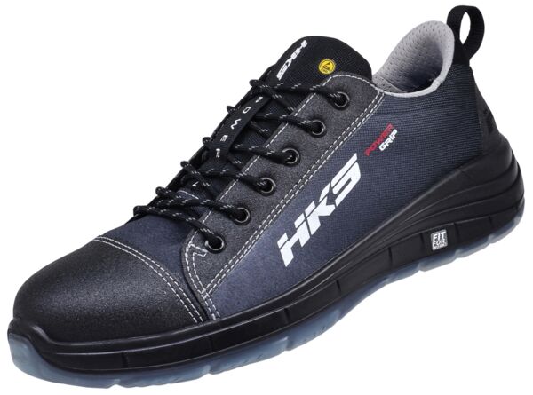 The shoe is a sporty, blue sneaker with a black front. It has a low lacing, a flexible sole, and bears the "HK3" logo on the side. The surface appears sturdy and modern.