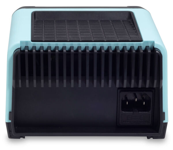 The image displays a compact device with a turquoise top and a black bottom. It features a continuously ridged back and a connector on the right side.