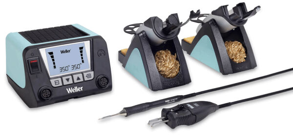 The image shows a soldering station with a digital display, two soldering tips in holders, and accessories. The station has a rounded shape and is in blue and black.