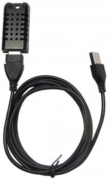 The image shows a black USB cable with a rectangular connector on one end. The other end has a flat USB plug. The cable is heavily coiled and has a textured surface on the connector part.