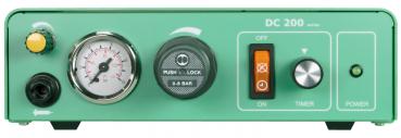 The image shows a green device with two rotary and three push buttons. A pressure gauge displays the pressure. On the right side, there are buttons for timer and power.