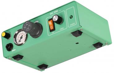 The image displays a green-painted device with rounded corners. On the top, there are a pressure gauge, a rotary knob, a switch, and an operation indicator light.