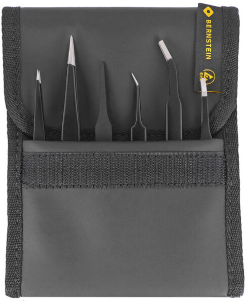 The image shows a black bag containing several tools. Inside are six sharp, thin tweezers in various shapes, neatly lined up side by side.