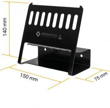 The image displays a black metal holder with a slanted back. It features a top surface with slot patterns and a stable base. The dimensions are 140 mm high, 150 mm wide, and 75 mm deep.