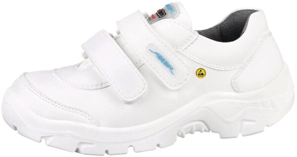 The shoe is white, with a wide, padded rim and two Velcro fasteners. The sole is sturdy with a coarse profile, ideal for secure grip and comfort.