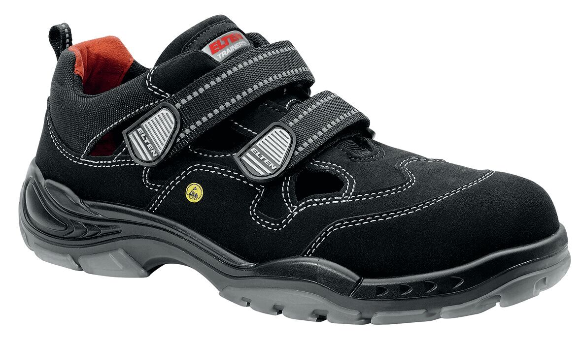 The shoe is dark blue, made from soft material with a reinforced sole. It has two wide, black Velcro straps and a padded insole for comfort.