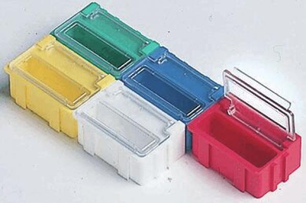 The image displays five rectangular plastic containers in various colors: Yellow, Green, Blue, White, and Red. Some containers have transparent lids. They are neatly arranged side by side.