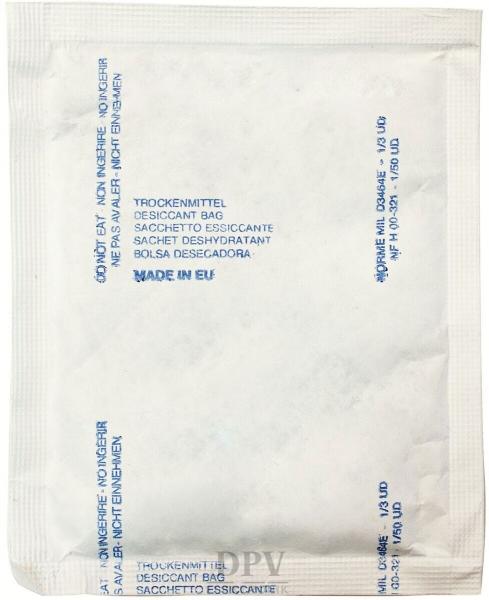 The image shows a white pouch with blue lettering. It is a desiccant used for moisture absorption in packaging.