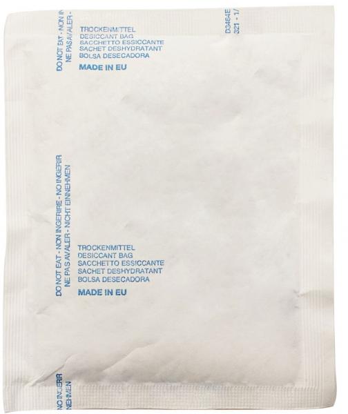 The image shows a beige packaging pouch with the inscription in blue font: "Trockenmittel", "Desiccant Bag", and other languages. The surface is smooth and solid-colored.