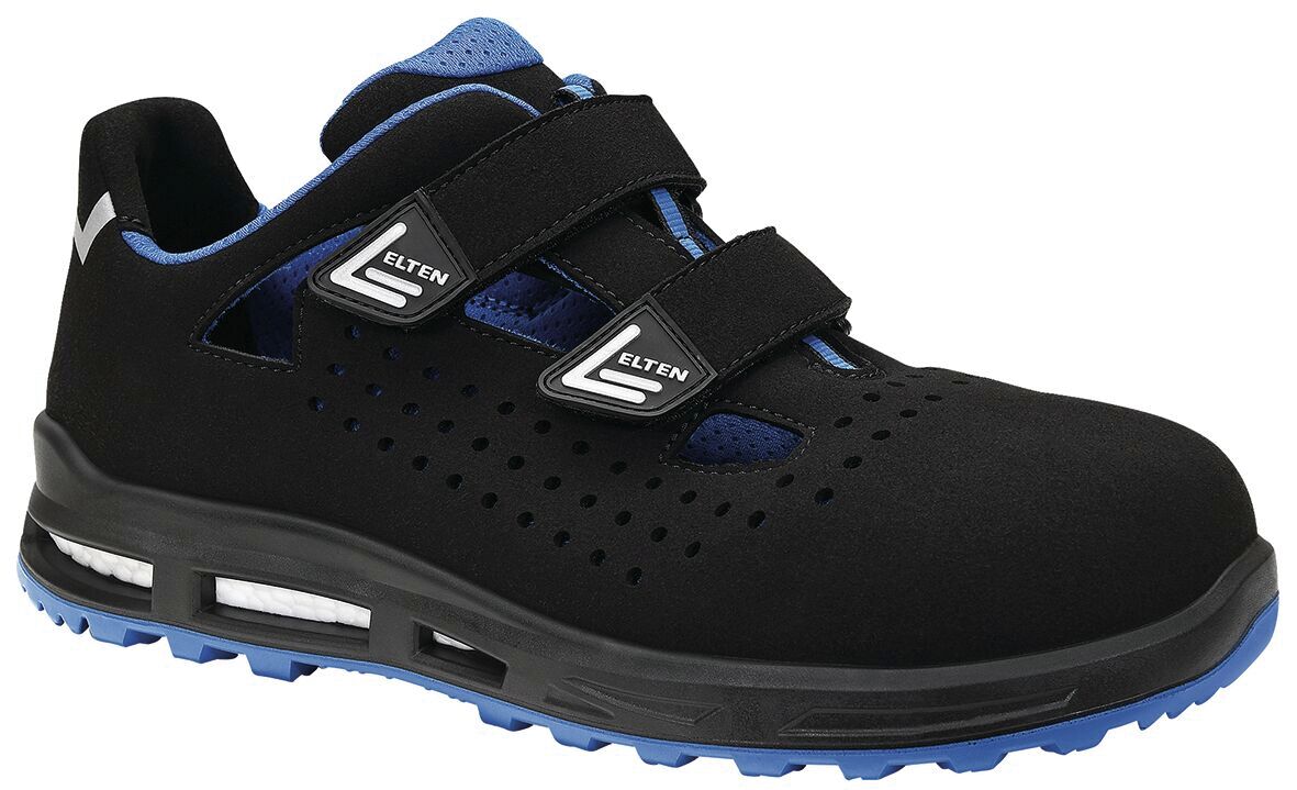 The shoe is black with blue details. It has two wide Velcro straps and is made of a breathable material. The sole is slip-resistant and has a distinctive tread.