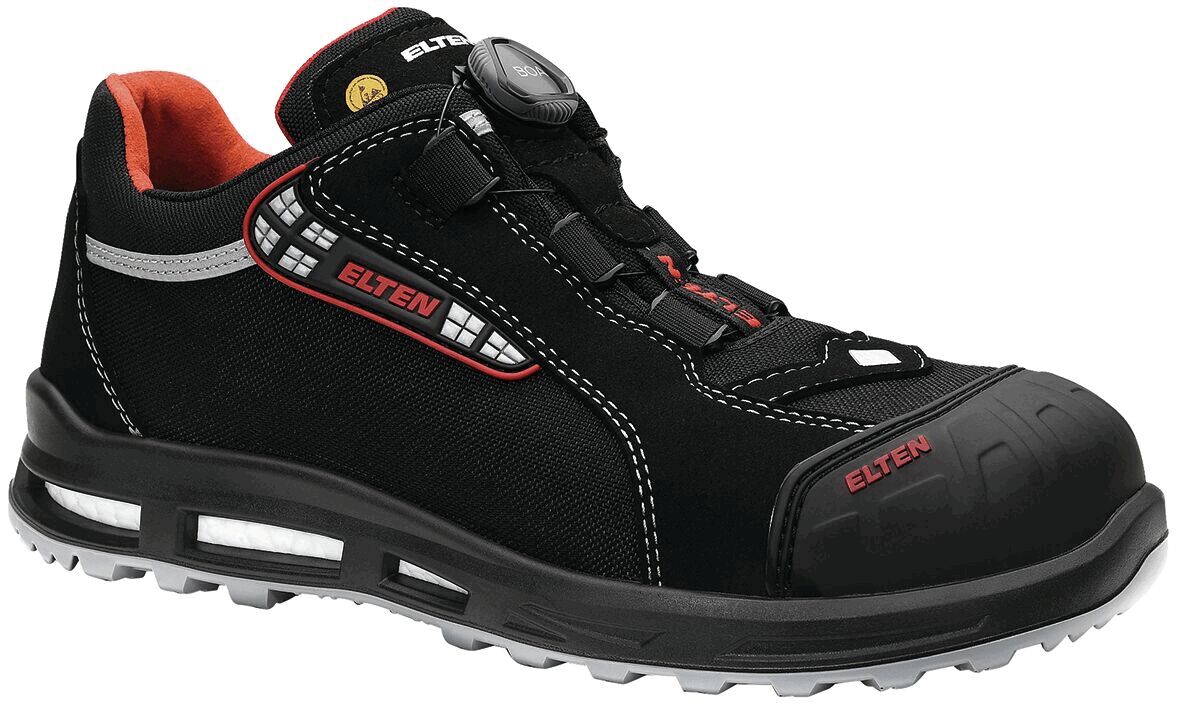 The shoe is black with red and white accents. It features a sturdy, non-slip sole area and a cushioned insole. There is a quick lacing system at the upper part.