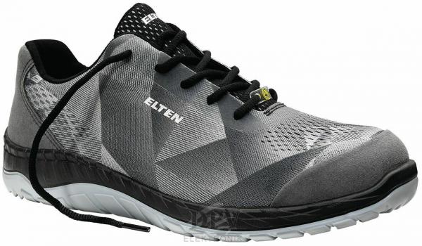 The shoe is sporty, gray with a modern, structured design. It has a light, flexible sole and black laces. The brand "ELTEN" is visible.