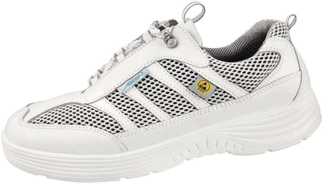 The shoe is predominantly white with a breathable mesh material. It has a round shape, a thick rubberized sole, and colorful accents on the sides. The closure mechanism is via a zipper.