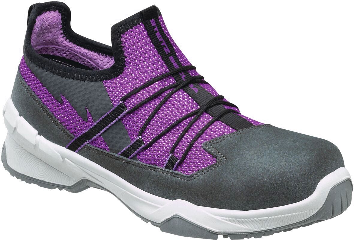 The shoe is a sporty, semi-open safety sneaker in gray and purple. It features a padded insole, elastic laces, and a sturdy rubber sole.