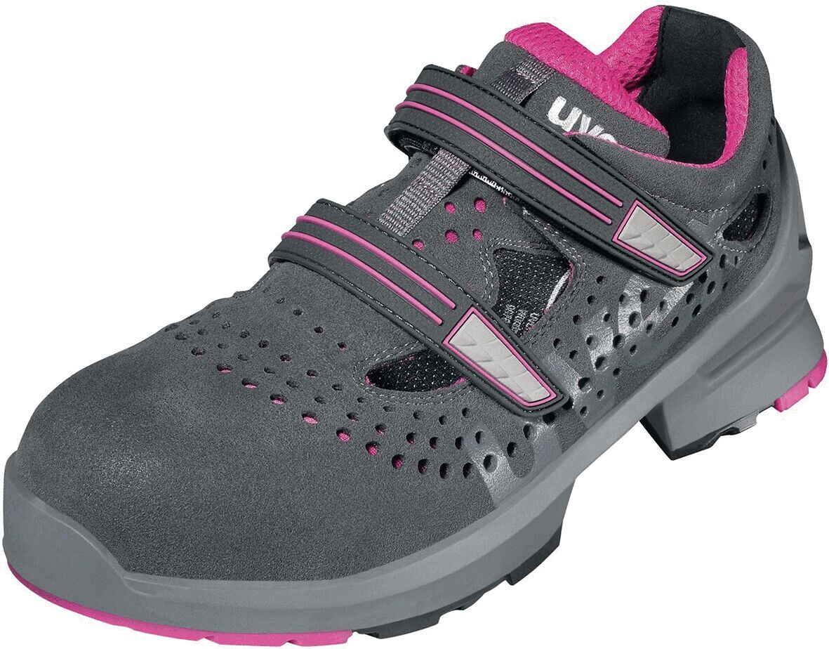 The shoe is made of gray material with airy holes. It has pink accents and two wide Velcro closures. The sole is sturdy and provides good grip.