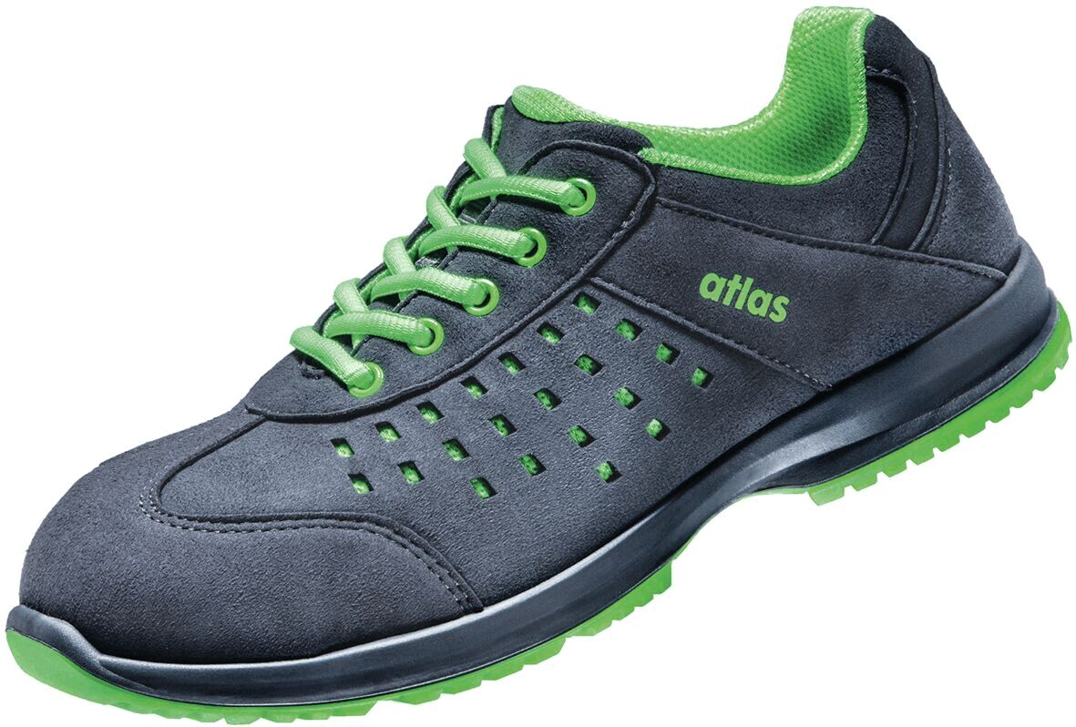 The shoe is a gray sneaker made of soft material. It has green accents on the sole, the laces, and the insole. The side of the shoe has small ventilation holes.