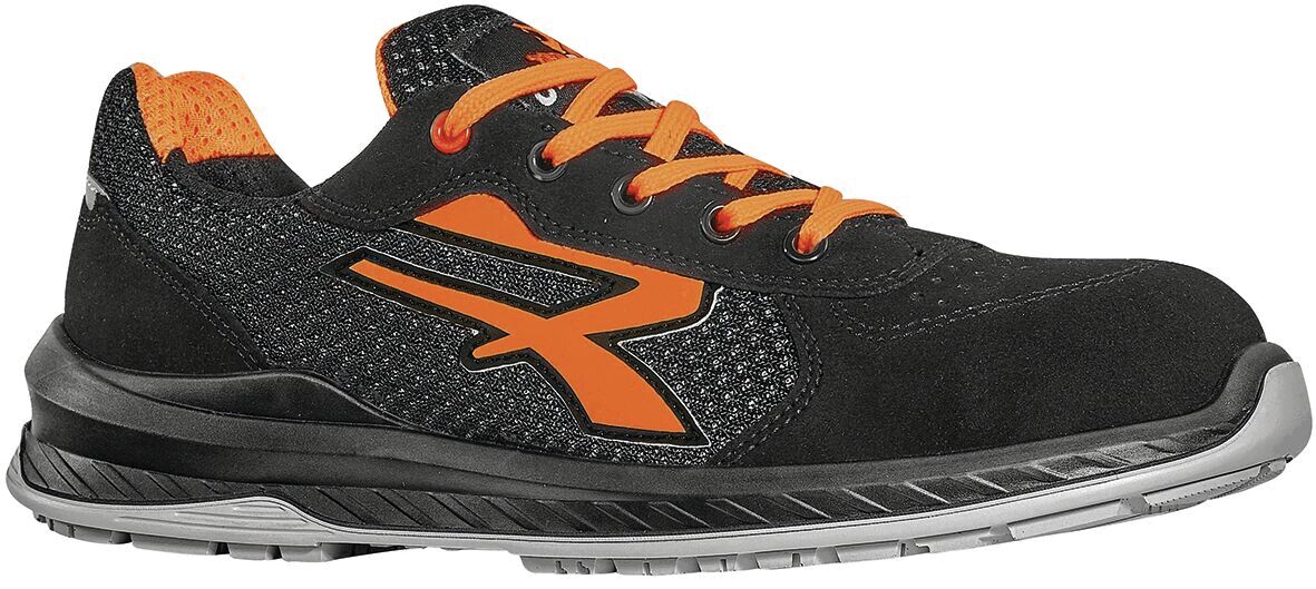 This is a black sports shoe with orange shoelaces and a striking orange logo. The sole is sturdy and well-suited for athletic activities.