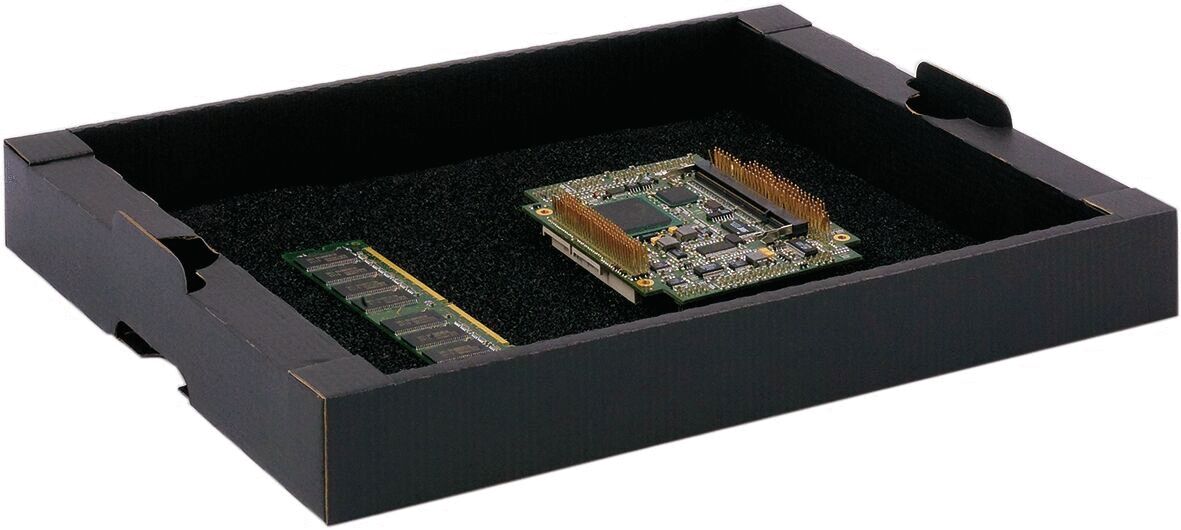 The image shows a black, flat box with a foam insert. Inside, there is a small circuit board with many contacts and a memory card on the left side.