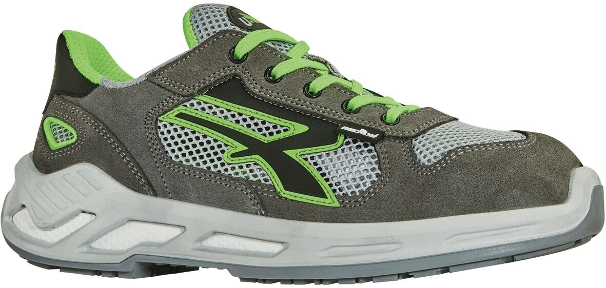 The shoe is a sporty sneaker in gray with green accents. It features a breezy mesh upper, laces, and a thick, white sole for good grip.