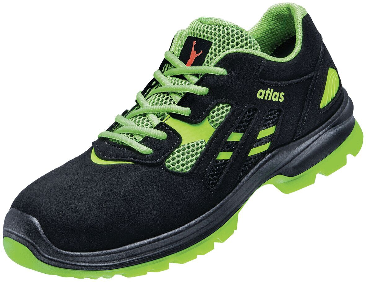 The shoe is sporty, with black leather and mesh upper combined with bright green accents. It has a grippy, non-slip sole and laces.